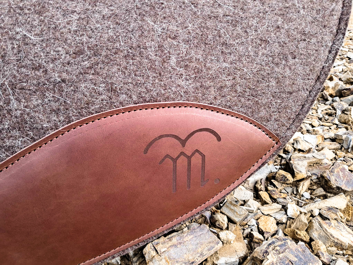 Leather feature, contoured spine, shaped fender pad - 13mm or 18mm felt in choc, grey or cream