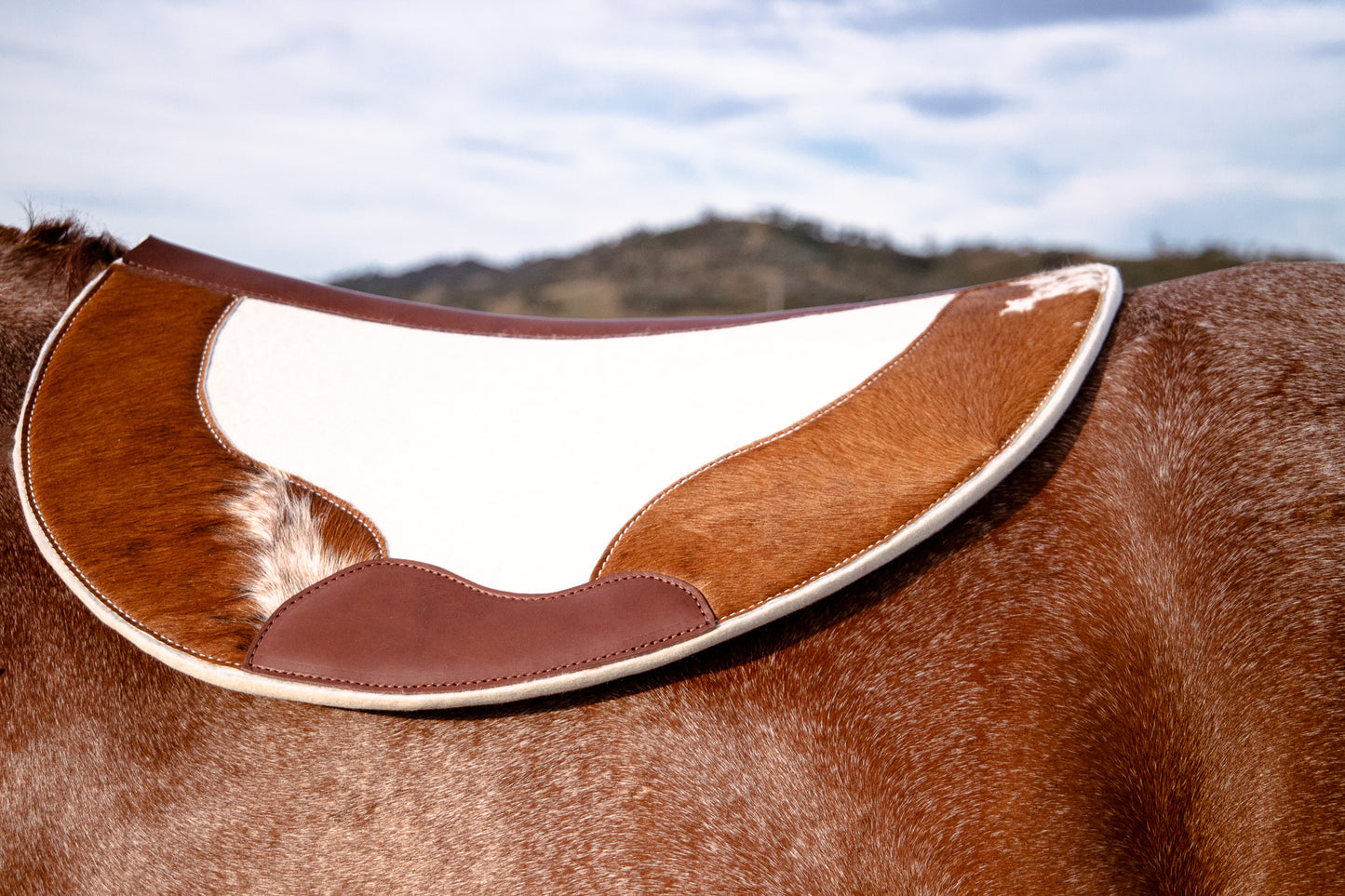 Hair on hide contoured spine, shaped fender pad - 13mm or 18mm felt - choice of hides and felt colour