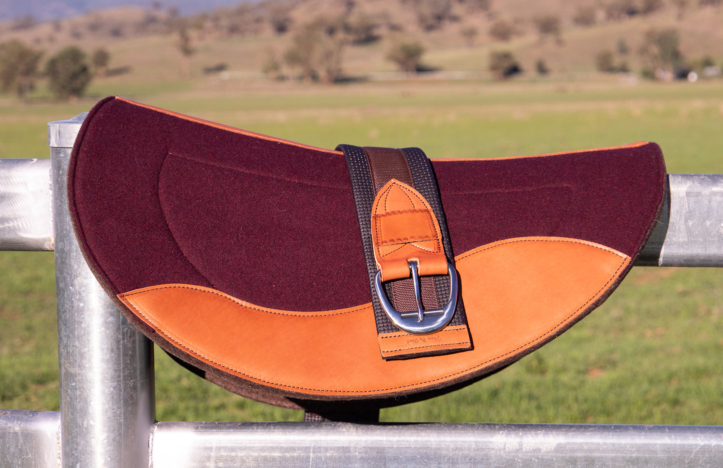 Kersey covered wool felt fender pad with contour spine and leather wears