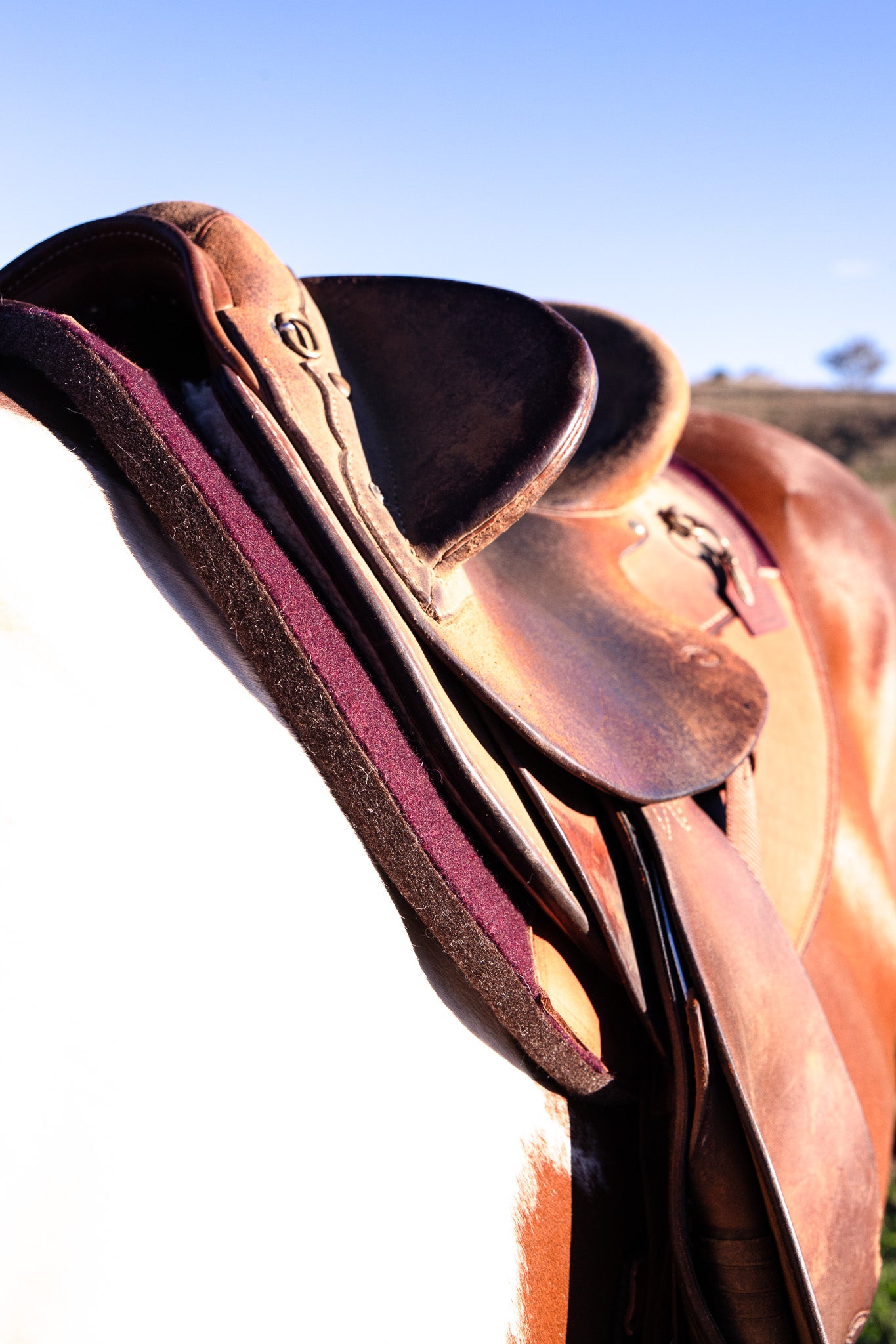 Kersey covered wool felt fender pad with contour spine and leather wears