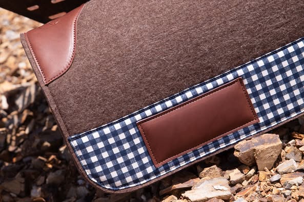 Flat wool felt pad with clover cutouts