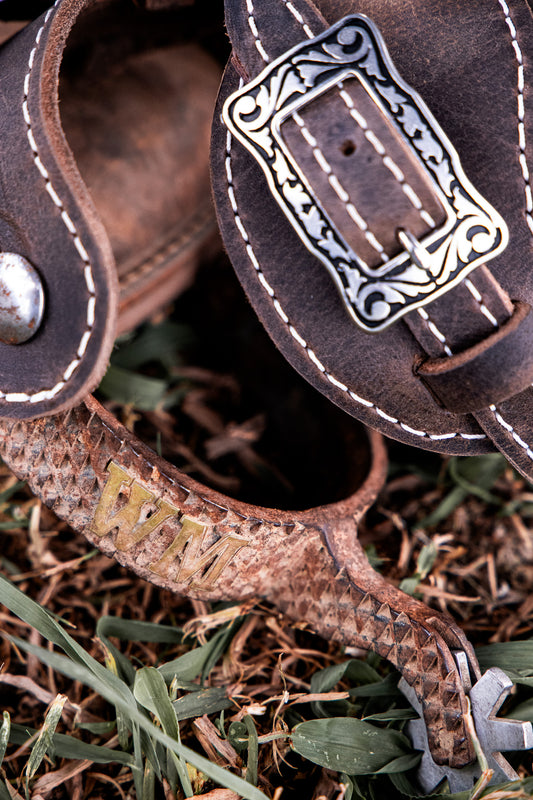 Waxed buffalo spur straps