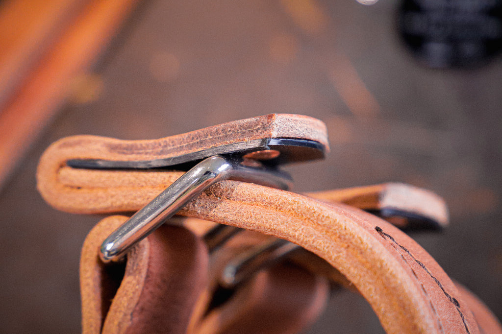 Quick release hobbles with reinforced tab