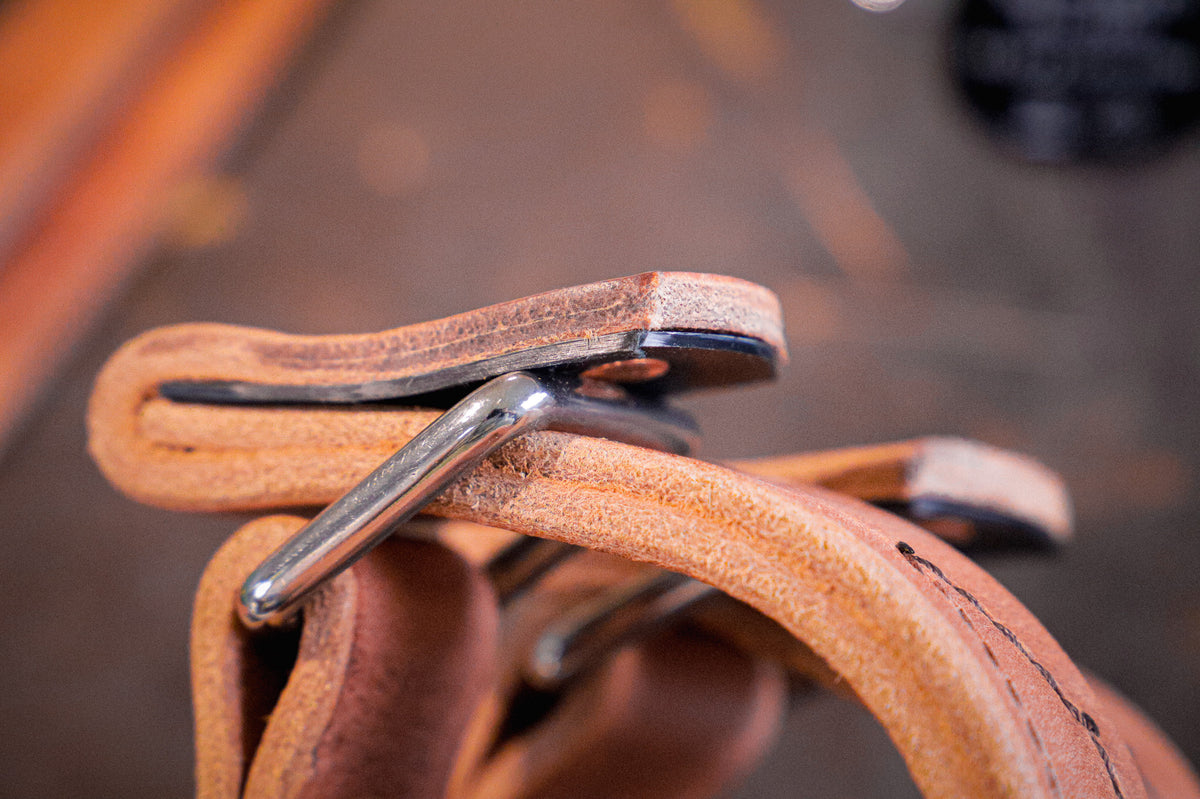 Quick release hobbles with reinforced tab