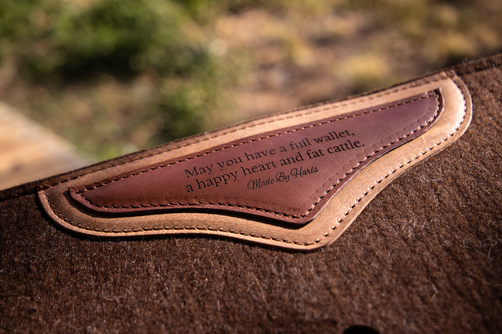 Brown crazyhorse & navy webbing clover spine wool felt pad
