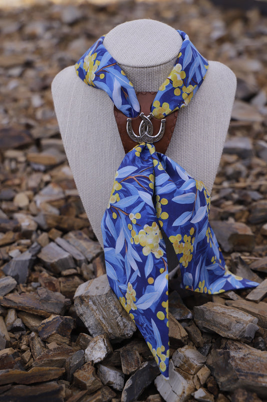 Leather scarf slide with stamped border and concho centre